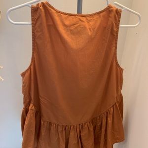 Burnt orange peplum top